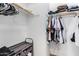 Spacious closet with hanging rods and shelving at 13713 W Harvest Ave, Litchfield Park, AZ 85340