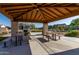 Covered picnic area with tables and grills at 13713 W Harvest Ave, Litchfield Park, AZ 85340