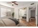 Bedroom with mirrored closet and access to hallway at 14413 N 91St St, Scottsdale, AZ 85260