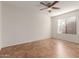 Spacious bedroom with tile flooring and ceiling fan at 14413 N 91St St, Scottsdale, AZ 85260