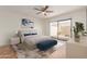 Spacious bedroom with patio access and designer furniture at 14413 N 91St St, Scottsdale, AZ 85260