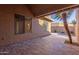 Covered patio with tile flooring and desert plants at 14413 N 91St St, Scottsdale, AZ 85260