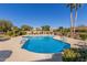 Inviting community pool with surrounding patio furniture at 14413 N 91St St, Scottsdale, AZ 85260