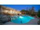 Stunning pool at night with lights and mountain views at 14845 S 31St Way, Phoenix, AZ 85048