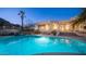 Expansive pool and spa with a view of the house and mountain backdrop at 14845 S 31St Way, Phoenix, AZ 85048