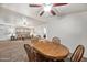 Small dining area with a wooden table and four chairs at 150 S Windsor -- # F87, Mesa, AZ 85204