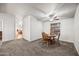 Cozy dining area with a wooden table and chairs at 150 S Windsor -- # F87, Mesa, AZ 85204