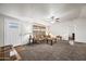 Bright and airy living room featuring a comfortable sofa and neutral color palette at 150 S Windsor -- # F87, Mesa, AZ 85204