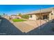 Artificial turf and gravel backyard with pergola at 1537 E Caballero Dr, Casa Grande, AZ 85122