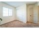 Spacious bedroom with double door closet and neutral carpeting at 1537 E Caballero Dr, Casa Grande, AZ 85122