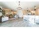 Open concept kitchen with island and stainless steel appliances at 1537 E Caballero Dr, Casa Grande, AZ 85122