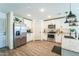 Modern kitchen with stainless steel appliances and white cabinets at 1537 E Caballero Dr, Casa Grande, AZ 85122