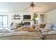 Cozy living room featuring a fireplace and neutral decor at 1537 E Caballero Dr, Casa Grande, AZ 85122