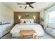 Large main bedroom with a ceiling fan and stylish decor at 1537 E Caballero Dr, Casa Grande, AZ 85122