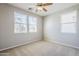 Spacious bedroom with neutral walls and carpet flooring at 1572 E Artemis Trl, Queen Creek, AZ 85140