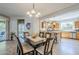 Well-equipped kitchen with light wood cabinets and stainless steel appliances at 1572 E Artemis Trl, Queen Creek, AZ 85140