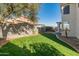 Well-manicured lawn with curved border at 16000 W Sherman St, Goodyear, AZ 85338