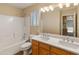 Bathroom boasts double sinks and a shower/tub combo at 16000 W Sherman St, Goodyear, AZ 85338