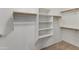 Walk-in closet with ample shelving and hanging space at 16000 W Sherman St, Goodyear, AZ 85338