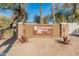 Wildflower Ranch community entrance sign with stone pillars and desert landscaping at 16000 W Sherman St, Goodyear, AZ 85338