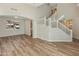 Open living room showcasing a staircase and high ceilings at 16000 W Sherman St, Goodyear, AZ 85338