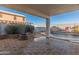 Inviting kidney-shaped pool with brick patio at 16000 W Sherman St, Goodyear, AZ 85338