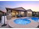 Stunning backyard with a pool, spa, and covered patio at 18022 E Vista Desierto --, Rio Verde, AZ 85263