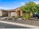 Single-story home with a welcoming entrance and xeriscaping at 18022 E Vista Desierto --, Rio Verde, AZ 85263