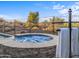 Relax in this luxurious hot tub, complete with a stone finish and mountain views at 18022 E Vista Desierto --, Rio Verde, AZ 85263