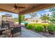 Relaxing backyard with covered patio, pool, and firepit at 18877 N 59Th Dr, Glendale, AZ 85308