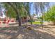 Backyard oasis with a hammock under shady trees at 18877 N 59Th Dr, Glendale, AZ 85308