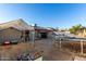 Backyard featuring sheds, a trampoline, and ample space for activities at 21063 N 33Rd Ln, Phoenix, AZ 85027