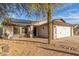 Charming single-story home featuring a two-car garage, xeriscaped yard, and solar panels at 21063 N 33Rd Ln, Phoenix, AZ 85027