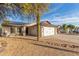 Street view of a single-story house boasting a two-car garage and solar panels at 21063 N 33Rd Ln, Phoenix, AZ 85027