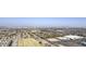 Aerial view showing city skyline, mountains, and suburban neighborhood at 2115 W Harwell Rd, Phoenix, AZ 85041