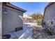 Backyard with gravel, pathway, and cacti at 2115 W Harwell Rd, Phoenix, AZ 85041