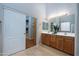 Elegant bathroom with double sinks and a spacious layout at 2115 W Harwell Rd, Phoenix, AZ 85041