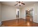 Hardwood floor bedroom with access to kitchen and bathroom at 2115 W Harwell Rd, Phoenix, AZ 85041