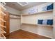 Large walk-in closet with ample shelving and storage at 2115 W Harwell Rd, Phoenix, AZ 85041