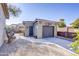 Detached garage with concrete driveway at 2115 W Harwell Rd, Phoenix, AZ 85041