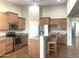 Kitchen with stainless steel appliances and an island at 2115 W Harwell Rd, Phoenix, AZ 85041