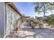 Landscaped side yard with brick walkway at 2115 W Harwell Rd, Phoenix, AZ 85041