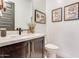 Stylish bathroom with a modern vanity, quartz countertop, and updated fixtures at 21632 W Hillcrest Blvd, Buckeye, AZ 85396