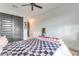 Well-lit bedroom with a bed and sliding closet doors at 21632 W Hillcrest Blvd, Buckeye, AZ 85396