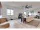 Relaxing living room with comfortable seating, large windows, and mountain views at 21632 W Hillcrest Blvd, Buckeye, AZ 85396