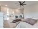 Main bedroom with ensuite bathroom and a cowhide rug at 21632 W Hillcrest Blvd, Buckeye, AZ 85396