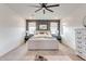 Main bedroom featuring a comfortable bed and natural light at 21632 W Hillcrest Blvd, Buckeye, AZ 85396