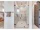 Large walk-in shower with built-in seat and modern fixtures at 21632 W Hillcrest Blvd, Buckeye, AZ 85396