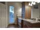 Double vanity bathroom with granite countertops and ample storage at 23861 N 74Th Pl, Scottsdale, AZ 85255