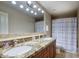 Bathroom with granite double vanity and shower/tub combo at 23861 N 74Th Pl, Scottsdale, AZ 85255